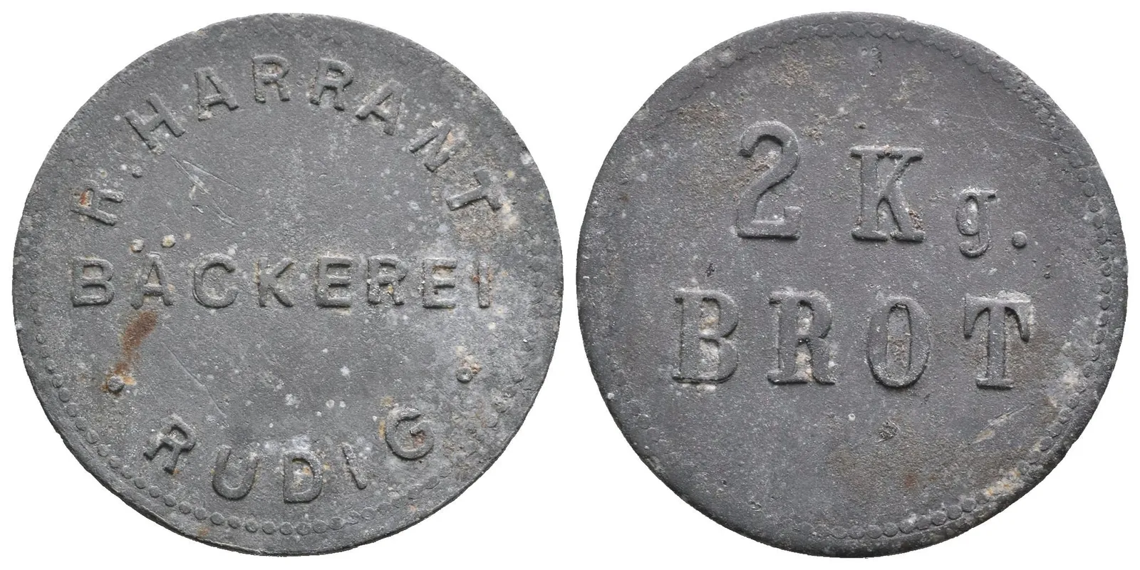 Vroutek / Rüdig - Pekárna R. Harrant, známka na 2 kg chleba. Zn 25 mm, — 1