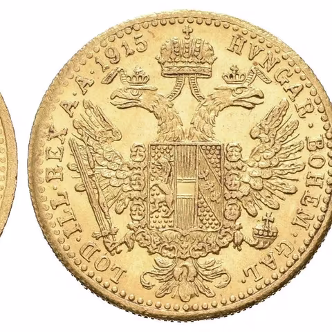 Dukát 1915, pod hlavou jugoslávská kontramarka s dvouhlavým orlem a číslem 1,