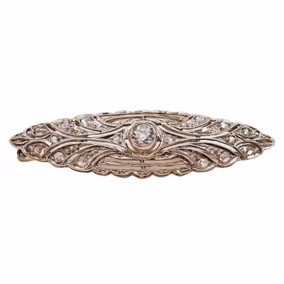 Zlatá brož Art Deco s briliantem a diamantovými routy