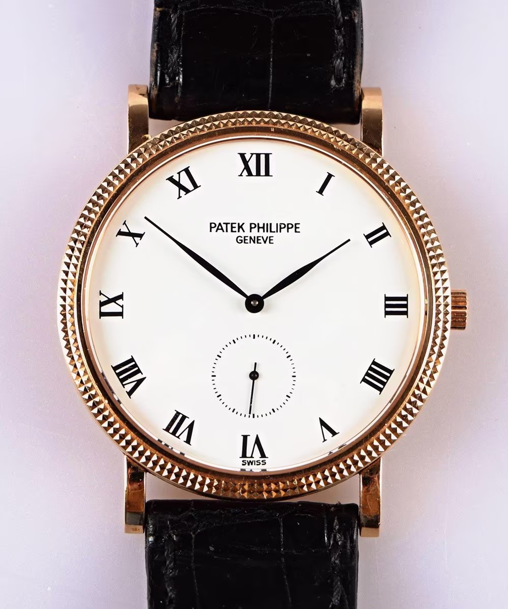 Zlaté pánské náramkové hodinky Patek Philippe Calatrava
