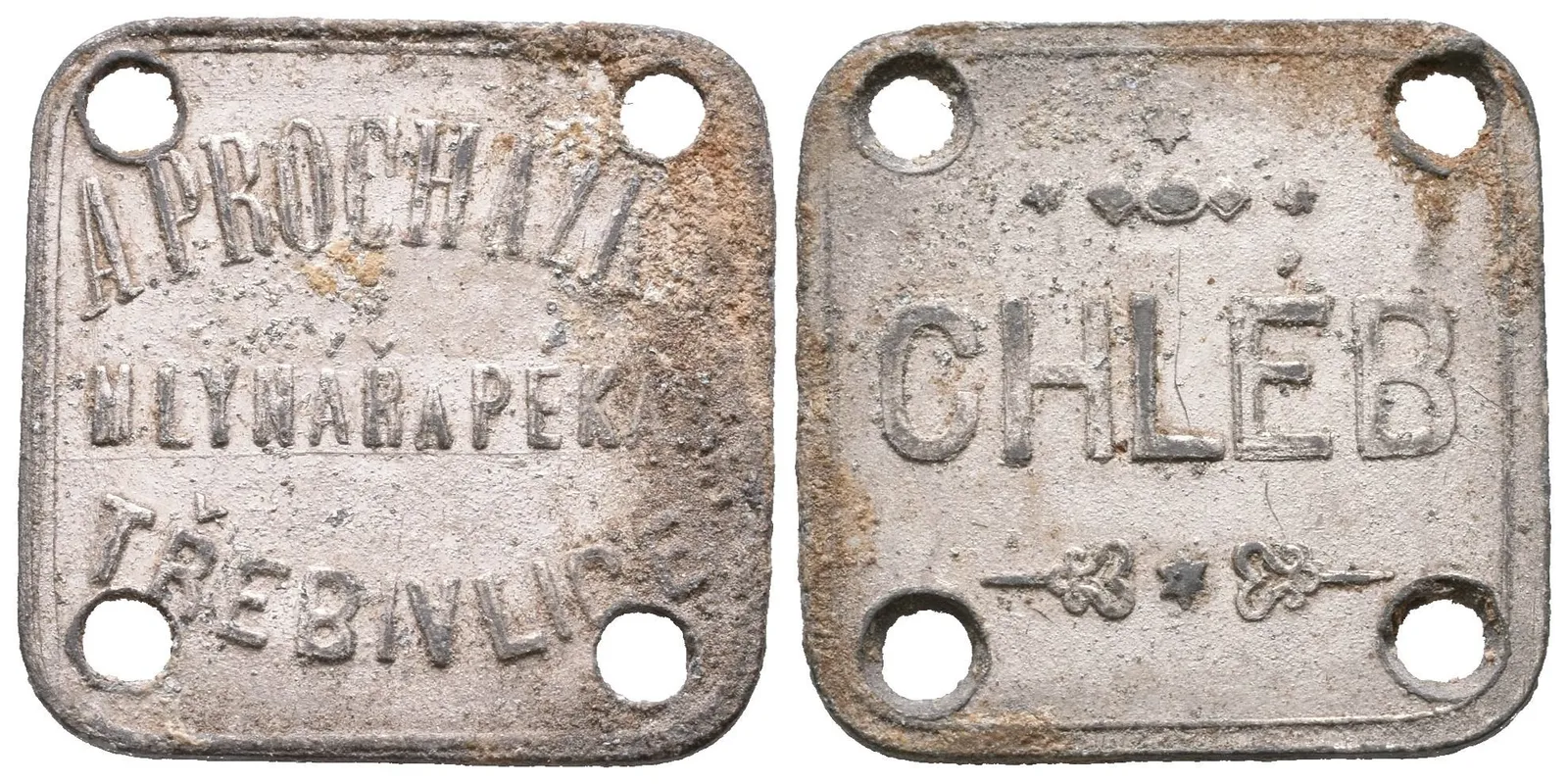 Třebivlice - A. Procházka, mlynář a pekař. Zn 23x23 mm, 4x dírka, oxidace — 1